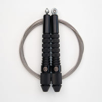 Corde à sauter noire avec câble en inox
