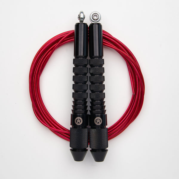 Corde à sauter noire avec câble enrobé rouge