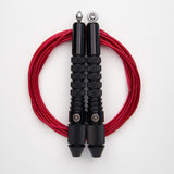 Corde à sauter noire avec câble enrobé rouge